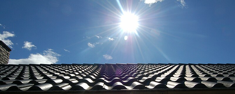 File:Roof of black bricks under sun.jpg