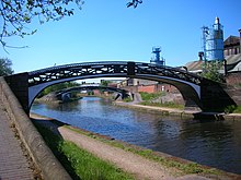 Two locally made Horseley Iron Works roving bridges at Smethwick Junction on the Birmingham Main Line Canal Roving bridges at Smethwick Junction.jpg