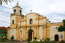 The cathedral in 2013 with orange painted pilasters San Juan Cathedral in Kalibo, Philippines.jpg