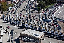 The San Ysidro Port of Entry is the fourth busiest border checkpoint in the world. Most traffic is related to commerce or day workers, rather than immigration. San Ysidro Border Traffic (8653133856).jpg