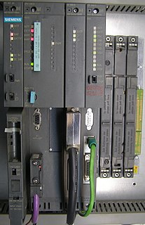 Programmable logic controller digital computer used for automation of electromechanical processes