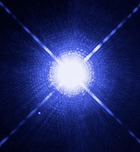 Image of Sirius A and Sirius B taken by the Hubble Space Telescope. Sirius B, a white dwarf, is the faint pinprick of light to the lower left of the much brighter Sirius A.