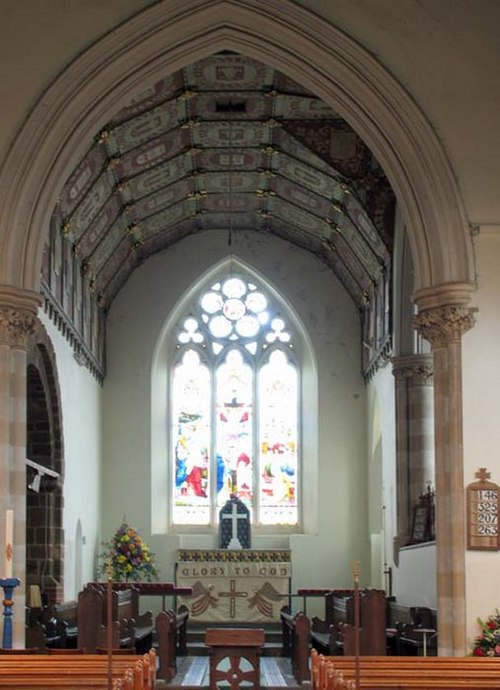 St Peter's, Lilley, Hertfordshire a medium-sized English church showing the nave, chancel arch, and a chancel with choir and sanctuary