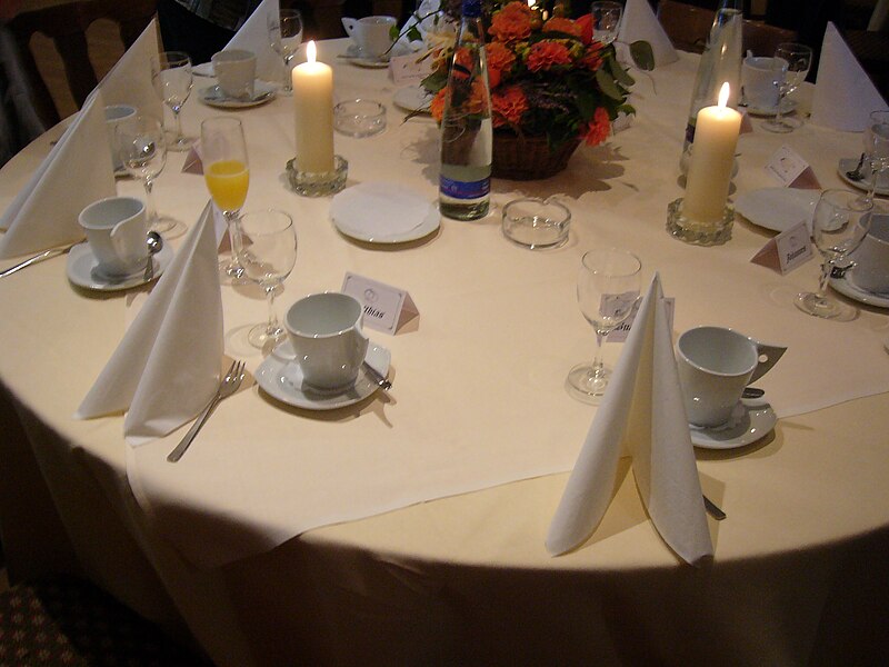 File:Table setting during a German wedding party showing a simple example of decorative napkin folding 2006.jpg