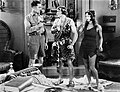 Al Ferguson, Frank MerrillFrank Merrill et Natalie Kingston (de g. à d.), dans Tarzan le TigreTarzan le Tigre (1929)