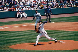 Tom Glavine pitches in spring training, 1998. Chipper Jones plays third base in background. Tom Glavine 1998.jpg