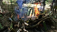 In East Timor, cooking food in bamboo is called tukir. Tukir (a way of cooking using bamboo as recipient to cook in the fire).jpg