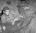 Two survivors of Nordhausen among corpses (cropped).jpg