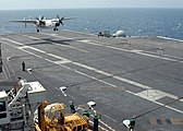 US Navy 050104-N-4336M-077 A C-2A Greyhound comes-in for an arrested landing aboard USS Abraham Lincoln (CVN 72) after providing humanitarian relief to the Tsunami-stricken coastal regions of Indonesia.jpg