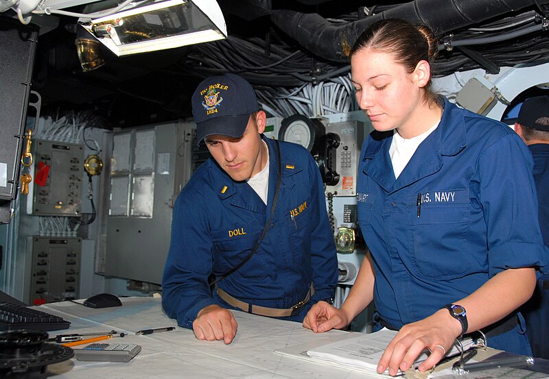 File:US Navy 070418-N-9689V-006 Ensign Brandon Doll, reviews the ship's position with Quartermaster Seaman Apprentice Angela Stewart.jpg