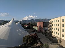 The Sports Science and Athletics Pavilion (left), Citrus Hall (right), and the Abraham Campus Center (middle) viewed from the parking structure. University of La Verne.jpg