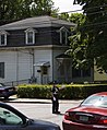 A Watertown police officer directs traffic outside the scene of a raid connected to the w:2010 Times Square car bombing attempt.