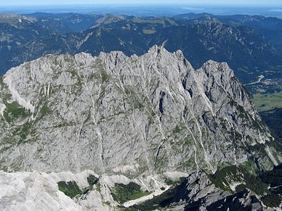 A view from Jubiläumsgrat over the valley to Waxenstein ridge and Ammergau Alps