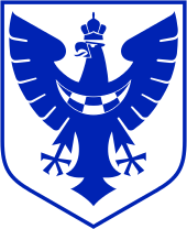 Erb zobrazující korunovaného modrého orla na bílém pozadí.