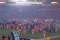 Volunteers tear down the stage after the halftime show of the 2008 Orange Bowl.