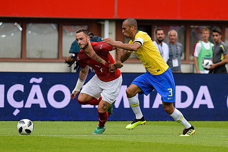 20180610 FIFA Friendly Match Austria vs. Brazil Arnautović Miranda 850 1946.jpg