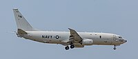 A US Navy P-8 Poseidon, tail number 168756, on final approach at Kadena Air Base in Okinawa, Japan.