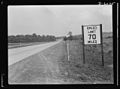 A pre-war sign gives unnecessary warning to wartime motorists 8b07393r.jpg
