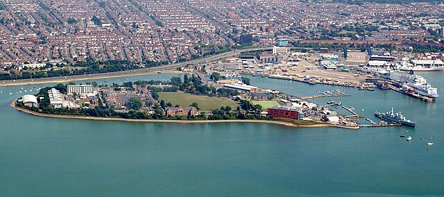 An aerial photo of HMS Excellent during 2005. The red building is Navy Command Headquarters