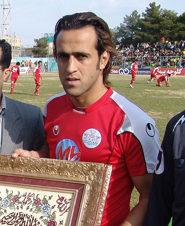 Karimi as captain of Persepolis before a friendly match