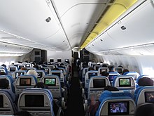 Economy Class cabin on a Boeing 777-300ER.