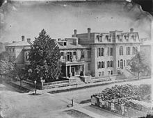 The building in 1872 (on the left), with the newly built De La Salle Institute on the right BankofUpperCanada.jpg