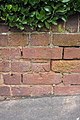 Benchmark on the wall of ^18 Howell Road - geograph.org.uk - 2749836.jpg