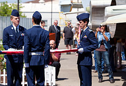 Civil Air Patrol cadets raise the Colors during an Armed Force Day celebration at the Aerospace Museum of California. California CAP cadets raise the colors.jpg