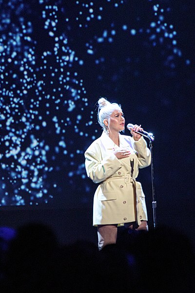 Aguilera performing "Reflection" during the D23 Expo in 2019, where she was honored as a Disney Legend