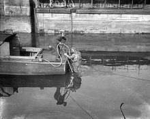 Diver involved in survey work for the Shannon Scheme, 1925