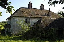 The impressive Concrete Cottages (before 1871), from the north, May 2018. Concrete Cottages, Old Burghclere, from the north, May 2018.jpg