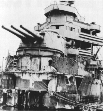 Damage to New Orleans with everything ahead of Turret No. 2 missing after being hit by a single torpedo that detonated her forward magazines. Photogra