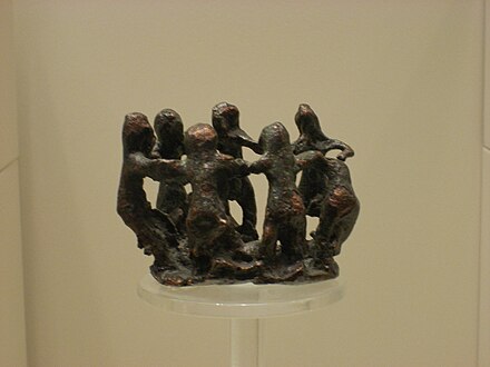 Women dancing. Ancient Greek bronze, 8th century BCE, Archaeological Museum of Olympia.