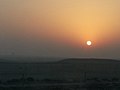 Desert sun , over the sand dunes far away- lusail Shooting range - panoramio.jpg
