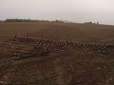 Three separate implements connected using a home made hitch Drag harrow.jpg