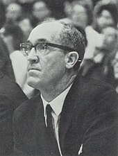 Duck Dowell coaching from the bench, as depicted in the 1963 "Promenade" yearbook