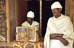 رهبان أرثوذكس يحملون مخطوطة إثيوبية