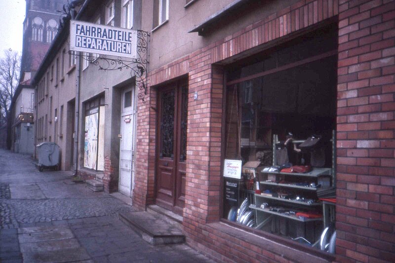 File:Fahrradteile u Reparaturen - Cycle Shop, Greifswald, DDR Jan 1990 (3834638828).jpg