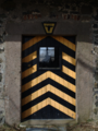 English: Building (entrance with Coats of arms of Riedesel family) near Ober-Mooser See (lake) Freiensteinau, Hesse, Germany
