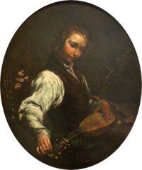 Portrait de jeune homme accordant sa pandurina
