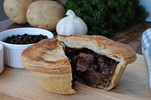 A handmade steak and ale pie. A very traditional English pie flavour Goddards steak and ale pie.jpg