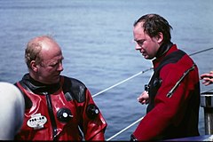 Gordon Smith, inventor and diver, protected by the orange dry-suit.