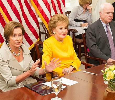 Dole with Nancy Pelosi and John McCain at a 2014 meeting of the congressional "Hidden Heroes Caucus"
