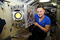 ISS-42 Yelena Serova works in the Rassvet module.jpg