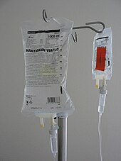 Drip chambers at the bottom of each of two IV bags Infuuszakjes.jpg