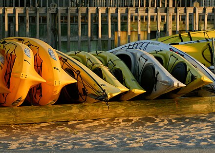 Lonely kayaks longing for the summer to arrive