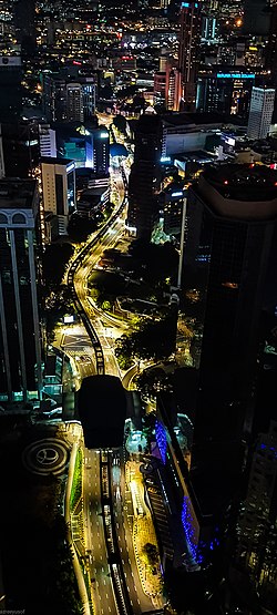 An aerial view of Jalan Sultan Ismail, a major road in Kuala Lumpur, at night with the KL Monorail line meandering above it. KL - Jalan Sultan Ismail from above at night.jpg