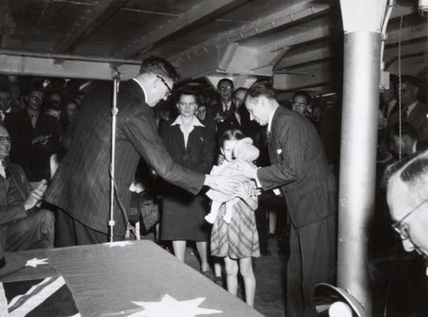 Arthur Calwell with the Kalnins family – the 50,000th New Australian – August 1949