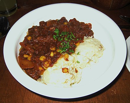 Kentucky burgoo served with mashed potatoes