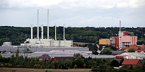 The power plant with the gas and steam turbine system (left) and residual waste treatment system (right)